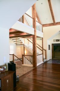 Steve Yochum-Built Home, focus on staircase, tile and hardwood interface.